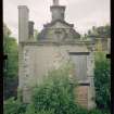 View from NE showing remains of pavilion with main block in background, Mavisbank House.