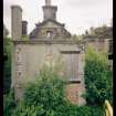 View from NE showing remains of pavilion with main block in background, Mavisbank House.