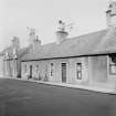 General view of fronts of 10 and 12 Fife Street, Banff.