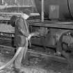 Ardrossan, Refinery & Bitumen Plant. View of fireless locomotive being supplied with a charge of steam.