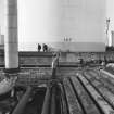 Ardrossan, Refinery & Bitumen Plant. View of pipes and storage tank.