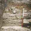 Stone revetment (67) excavated in Trench 8 in the W outer enclosure.