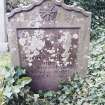 Forgan, St. Fillan's Churchyard.
General view of gravestone with wavy top and star/sun emblem.
Insc: 'Erected by Alixe Mill in memory of his son John who departed this life November 21 1819 aged 17 years'.