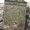 Forgan, St. Fillans Churchyard.
General view of gravestone with arched top. Very finely carved with winged soul in pediment with greek-key and rosette design below. Inscription panel with urns and rosettes, and central hourglass.
Insc: 'Puritas/A Rachels beauty, Lydia's open heart/A Martha's care and Mary's better part/In her were all combined./Her spirit fled from earth to Heaven/Her body here to dust is given./Both shall again be joined'.