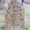 Forgan, St. Fillan's Churchyard.
General view of gravestone. Scissors, iron, pin and what may be a thimble or a crown.
Insc: 'Heir Lies Margaret Davidson Spouse To James Kilpatrick Who Deceased 1707 And Of.....Aged 29'.