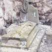 Forgan, St. Fillan's Churchyard.
General view of the gravestone of the Reverend David Thomson. Recumbant monument with raised cross, tapering headstone with draped urn.