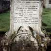 View of broken headstone.