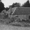 View of S block of farmsteading from E.