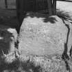 Photograph of broken standing stone in Rhynie Square.