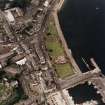 Oblique aerial view of Rothesay centred on the winter gardens, taken from the ESE.