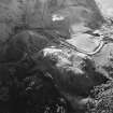 Oblique aerial view centred on the remains of the fort, taken from the NE.