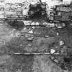 Excavation photograph : south range - room 4 floor, from south.