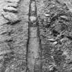 Excavation photograph : outside palace, pipe trench with paving, from south.