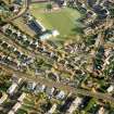 Near vertical aerial view of Stratherrick Road and Lochardil Primary School, looking NE.