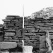 Panoramic of broch walls from interior centre.