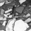 Collection of stone implements SF$$& ET SEQ>  North-east quad JCB scrape.  Scale at N67.75 x E91.1-91.6.