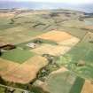 General oblique aerial view of farmland to the N of Nigg, Easter Ross, looking E.