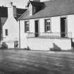 General view of nos. 75-79 Main Street, Glenluce, from NW.