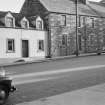 General view of nos. 124, 126, 128 George Street, Whithorn, from south west.