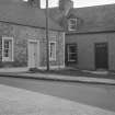 View of nos 133 and 137 George Street, Whithorn, from south.