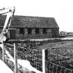 Construction Photograph: Coastal restorative work to build a breakwater for the future protection of Jarlshof.
Park E-W.