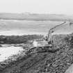 Construction Photograph: Coastal restorative work to build a breakwater for the future protection of Jarlshof.
Access road on beach E-W.