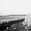 Construction Photograph: Coastal restorative work to build a breakwater for the future protection of Jarlshof.
Access road on beach E-W.