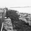 Construction Photograph: Coastal restorative work to build a breakwater for the future protection of Jarlshof.
Top section after in-filling W-E.