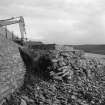 Construction Photograph: Construction of breakwater.