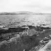 Construction Photograph: Construction of breakwater.