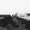 Construction Photograph: Construction of breakwater.