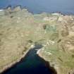 Oblique aerial view of the central part of the Isle of Muck, looking NW.