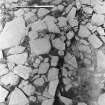 Excavation photograph : trench Aa - L189 flags and L190 rubble.

(see MS/682/120 for detailed description)