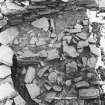 Excavation photograph : trench AH Baulk - wall L336 and various rubbles.

(see MS/682/120 for detailed description)
