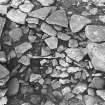 Excavation photograph : trench A - rubble L264 putative wall L222 surrounding.

(see MS/682/120 for detailed description)