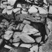 Excavation photograph : trench H - detail of blocking? L254.

(see MS/682/120 for detailed description)