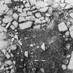 Excavation photograph : trench AaX - stone setting L352 cutting old surface 353.

(see MS/682/120 for detailed description)