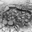 Excavation photograph : trench A(a)X - detail - rubble L373 bounded by stone setting L365.

(see MS/682/120 for detailed description)