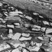 Excavation photograph : trench Aa - wall L114 running left to right, L54 rubble to front

(see MS/682/120 for detailed description)