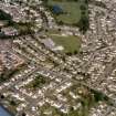 Oblique aerial view of houses in the S part of Inverness, looking E.