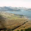 An oblique aerial view of Upper and Lower Breakish, Broadford, Isle of Skye, looking W.