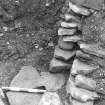 Excavation photograph :  trench X - detail of ditch fill L1837 and earlier rampart L1845.


