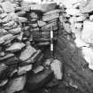 Excavation photograph :  trench X - detail of L58 butting against L1870.

