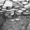 Excavation photograph :  trench X - detail of L58 over rubble below L1539.

