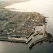 Oblique aerial view of Lossiemouth Harbour, Moray, looking W. 