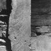 Interior of cairn; runes - detail (LHS)