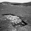 Excavation photograph : section through wall of hut Circle II.