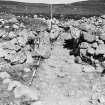 Excavation photograph : extended entrance of Hut Circle V.