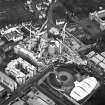 Oblique aerial view showing the construction of the Scottish Parliament and `Our Dynamic Earth' adjacent, Edinburgh