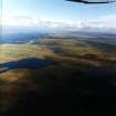 General oblique aerial view looking across Bragar up the west coast of Lewis towards Arnol